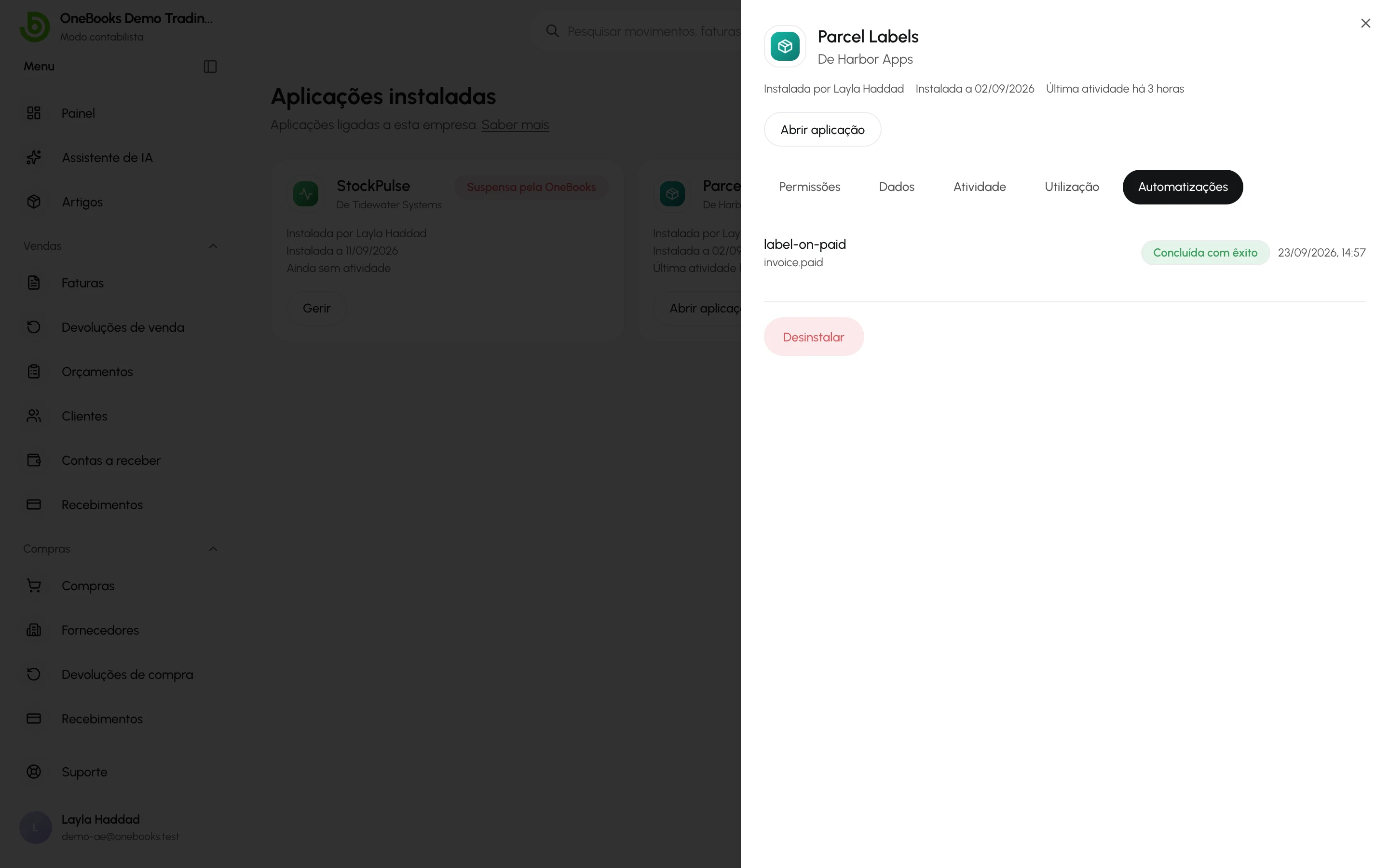 O separador Automatizações com uma execução iniciada por invoice.paid, marcada como Concluída com êxito